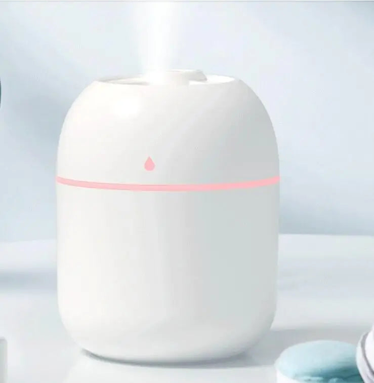 Eway USB humidifier with built-in aromatic diffuser, compact air moisturizer with scented mist in a sleek design.