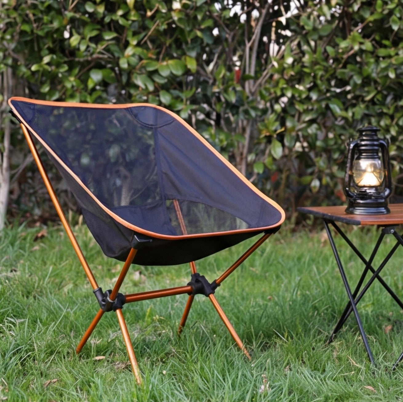 Eway foldable camping chair with lightweight frame, black fabric seat, and portable design for outdoor activities.