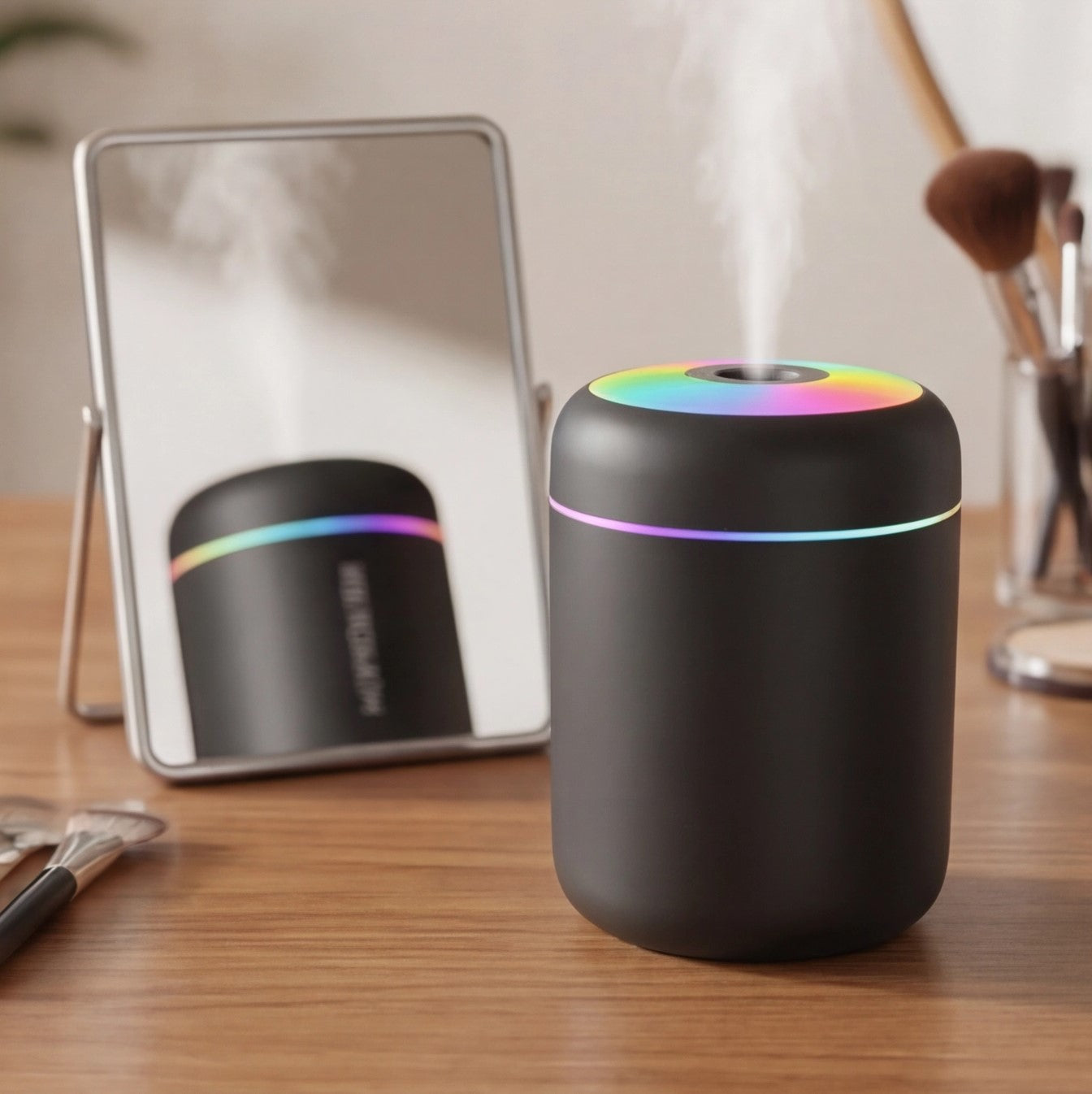 Eway USB small air humidifier emitting a gentle mist, compact personal humidifier on a desk.