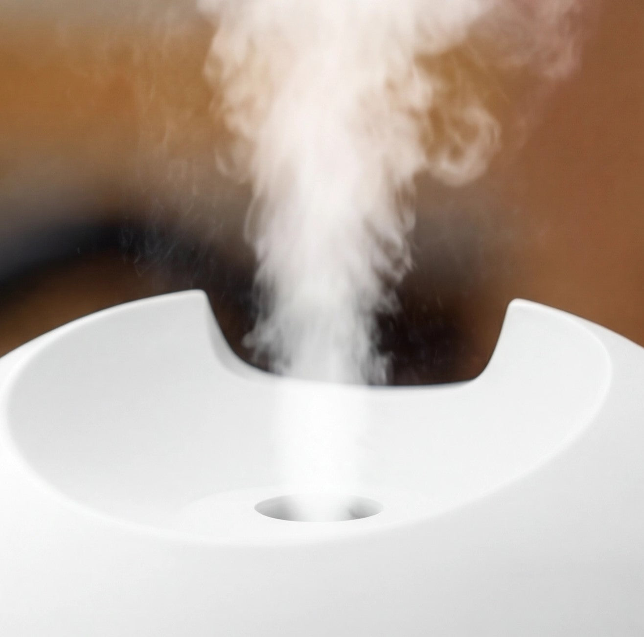 USB humidifier with fragrance diffuser by Eway, showing a compact air humidifier with a sleek design and aromatic scent container.