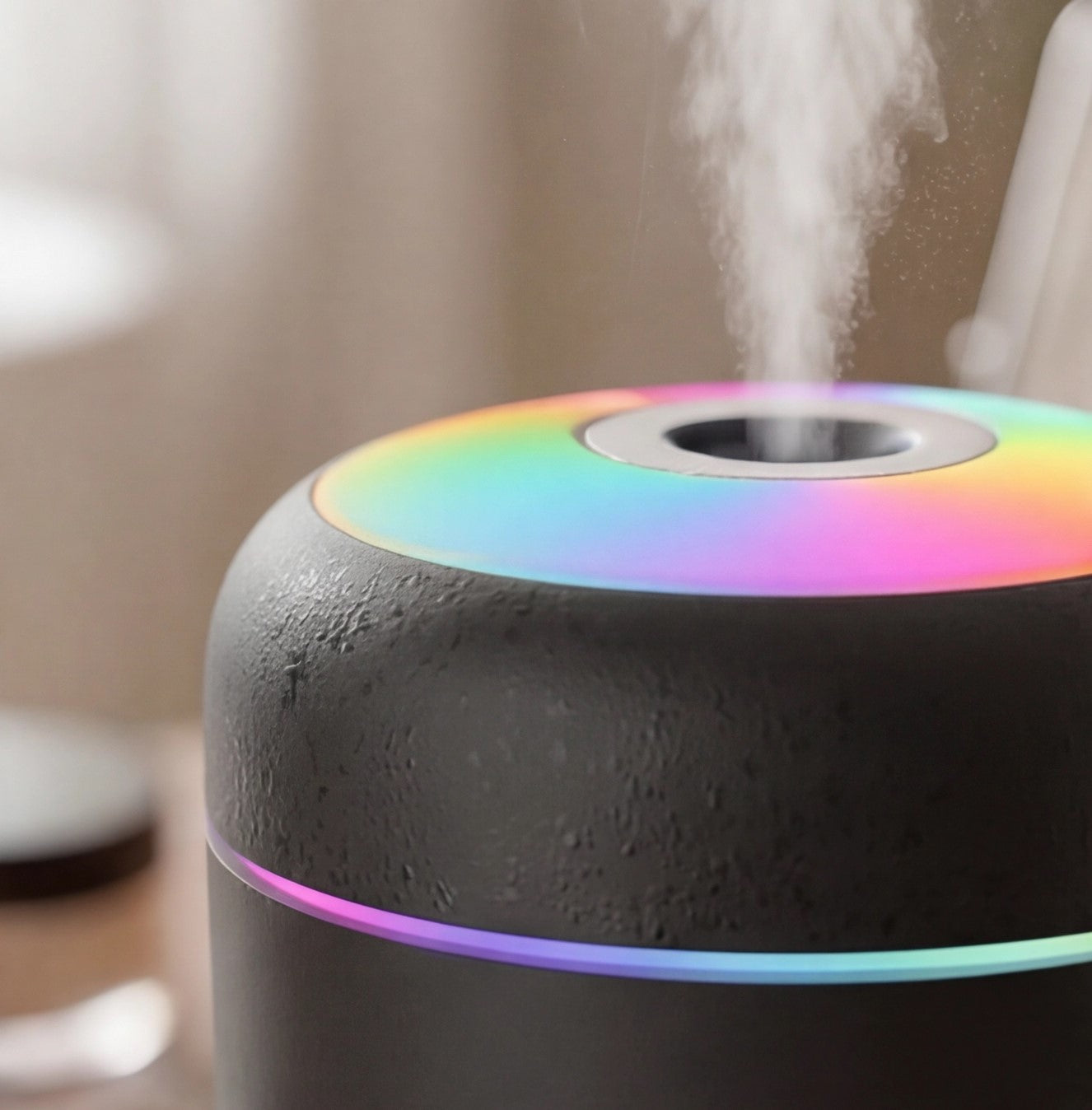 Small USB air humidifier by Eway, compact device with water tank for adding moisture to the air.