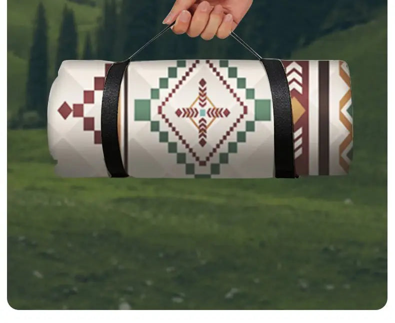 Eway Oxford camping mat, soft and lightweight travel fabric rug displayed on outdoor ground with camping gear.