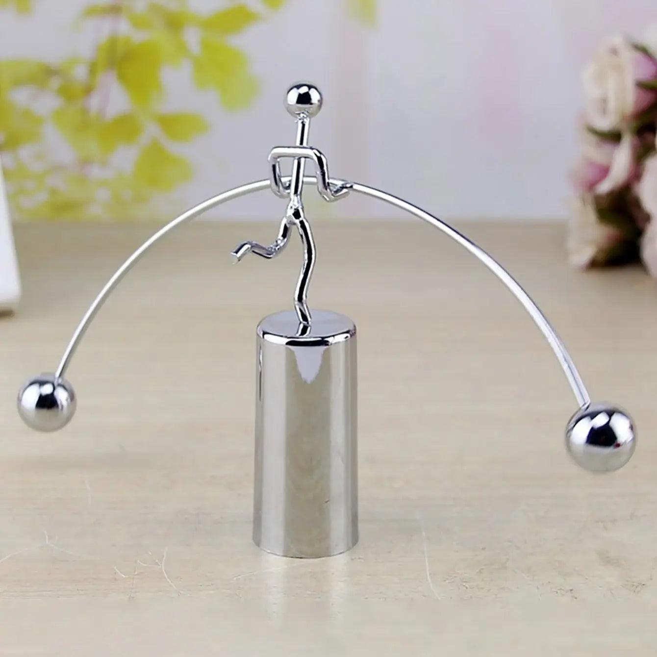 Eway balanced man statue showing a serene figure in a meditative pose, with detailed features and artistic craftsmanship.
