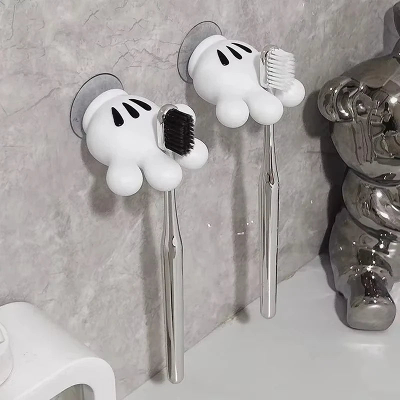 Wall-mounted cartoon toothbrush holder by Eway, designed for organizing toothbrushes with a playful cartoon style.