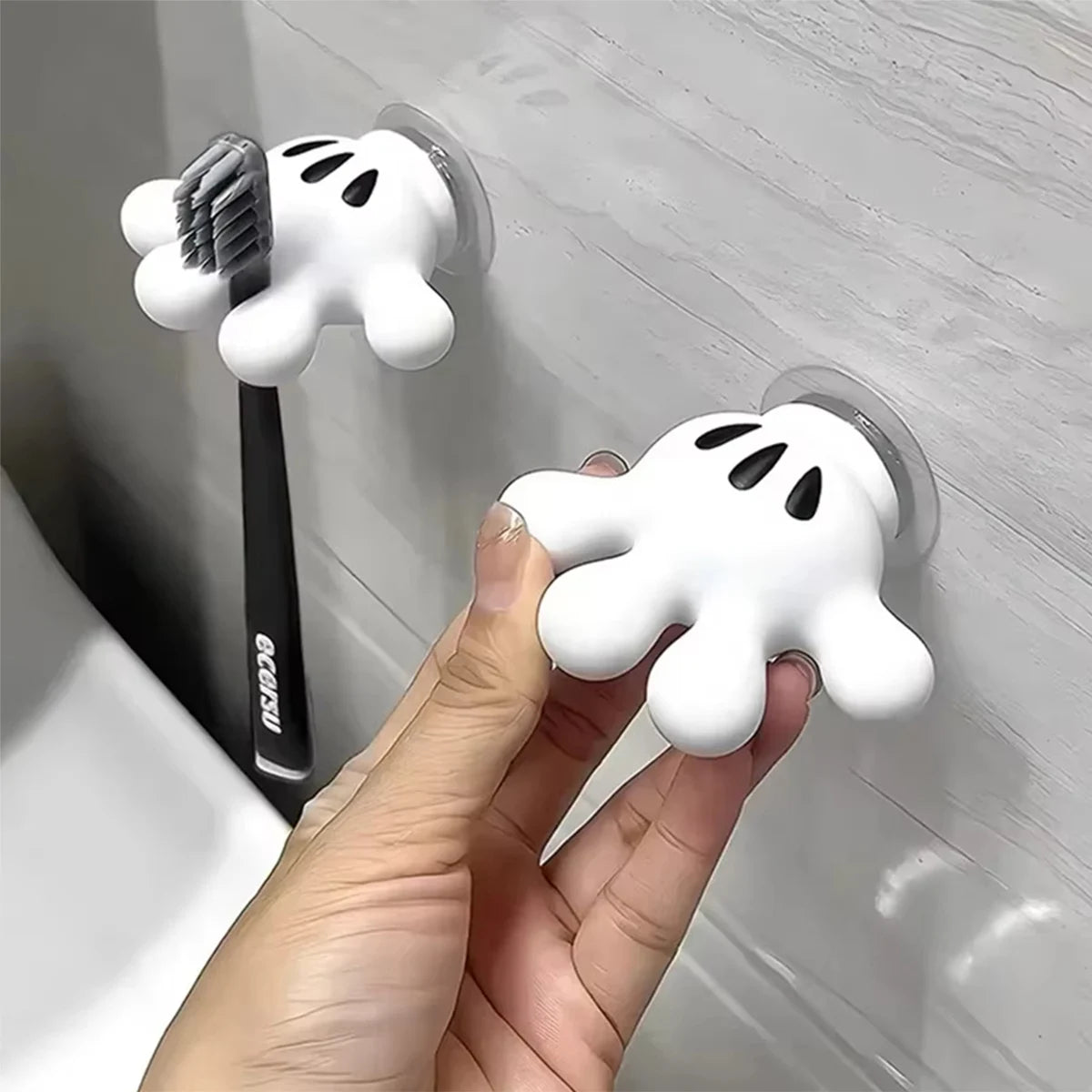 Eway wall-mounted cartoon toothbrush holder showcasing a playful design with space for multiple toothbrushes.