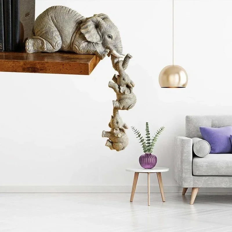 Set of three wooden elephant figurines by Eway, featuring detailed handcrafted designs for decorative display.