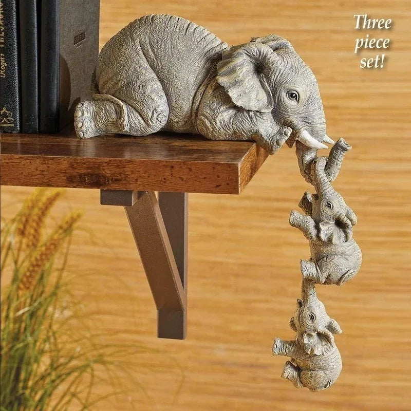 Set of three wooden elephant figurines by Eway, natural wood finish, detailed carved design, ideal for home decor or gifts.
