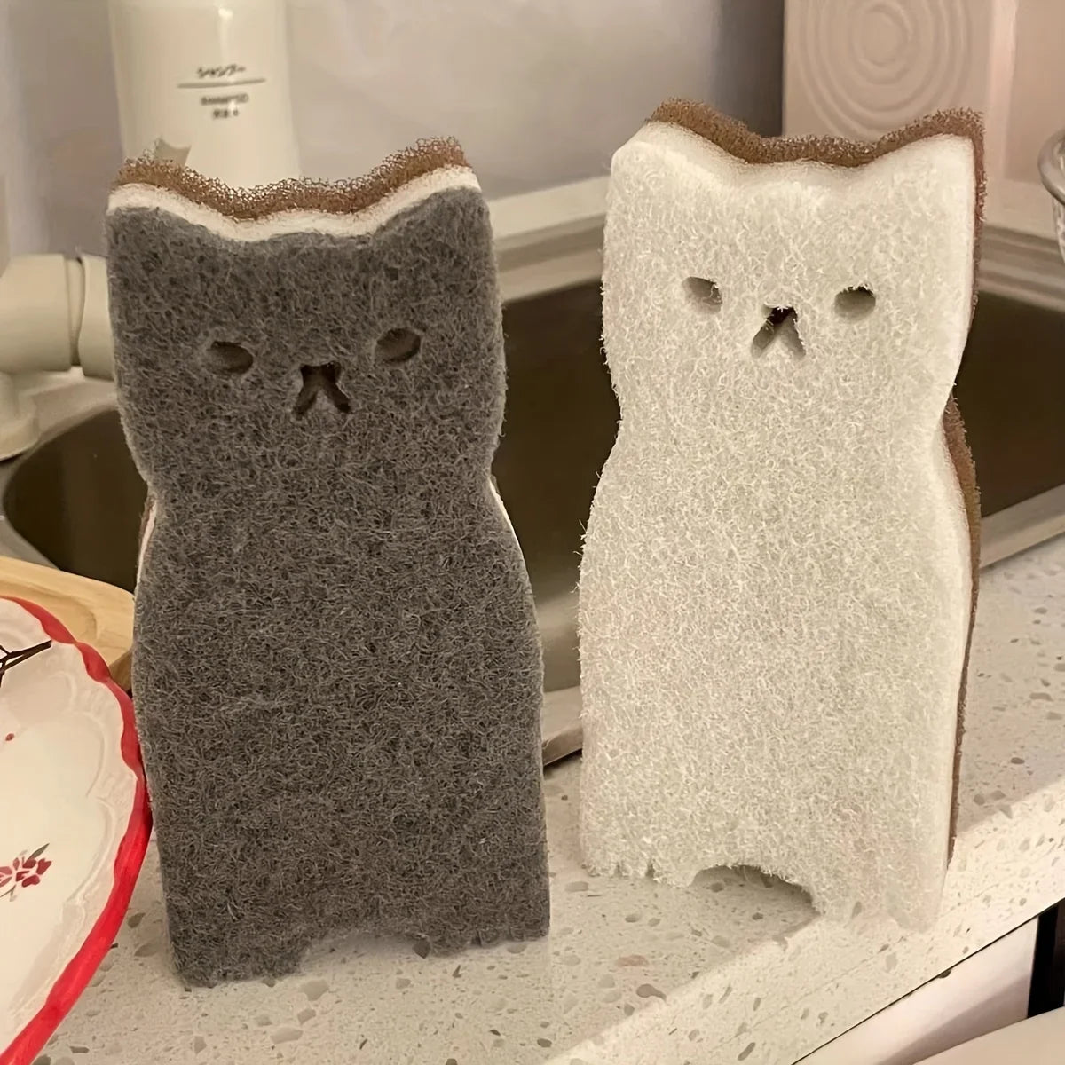 Eway cat-shaped cleaning sponge with soft, colorful surface ideal for gentle cleaning tasks and scrubbing surfaces.