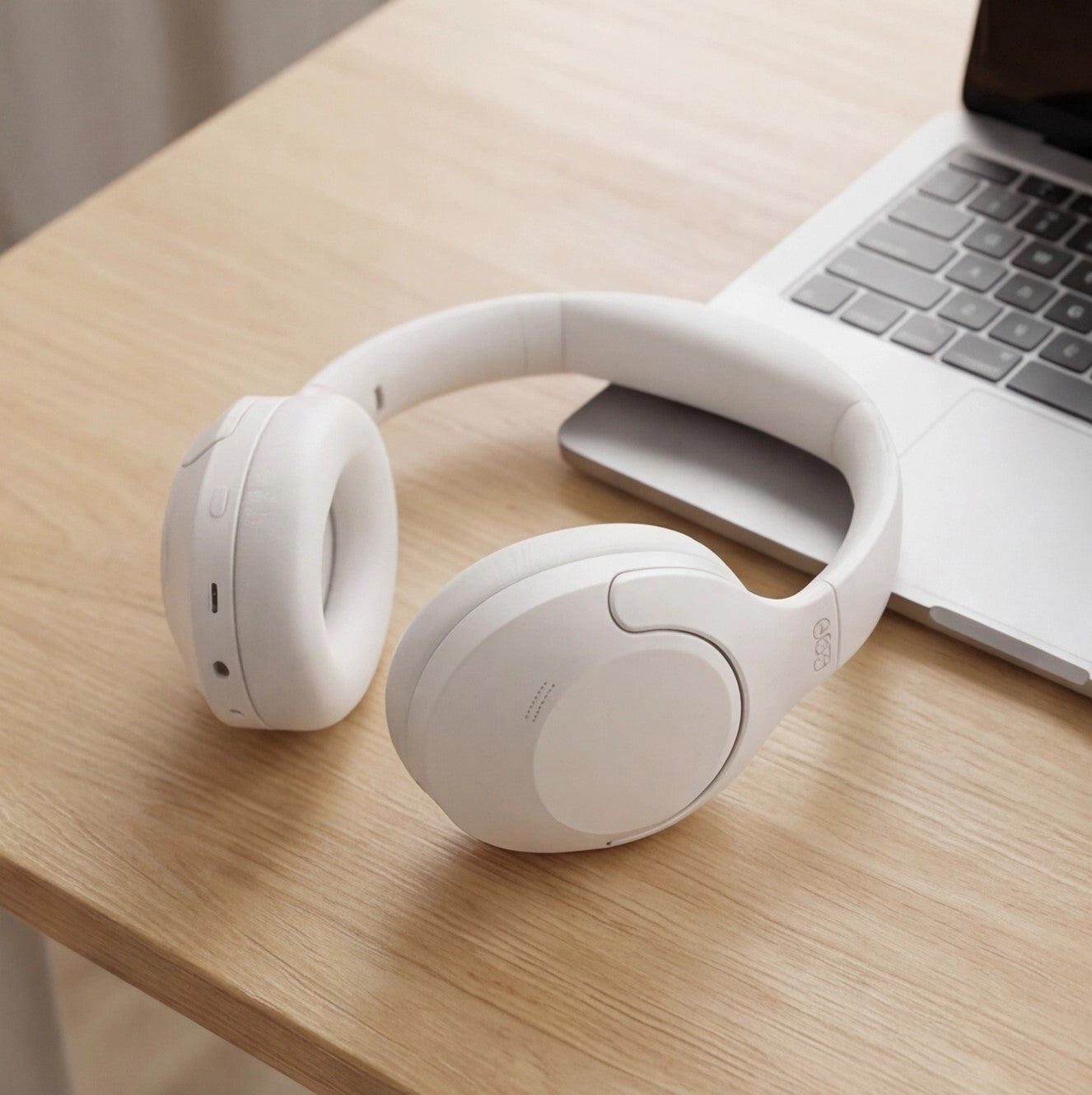Eway QCY H3 Lite ANC wireless earbuds with charging case and sleek black design, positioned on a white background.