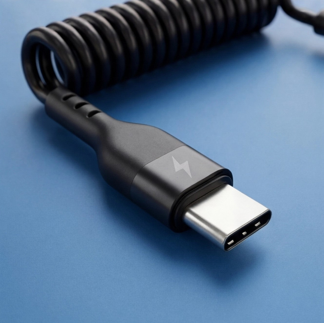 Eway Type-C retractable charging cable with flexible design, shown coiled and extended for convenient device charging.